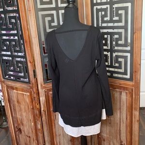 Black waffle knit top with contrasting shirt hem